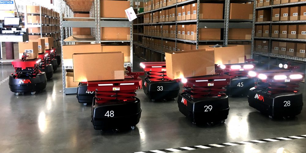 inVia’s Picker robots rolling through a warehouse.